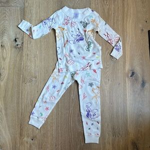 Little girls Hanna Andersson Frozen II pajamas.